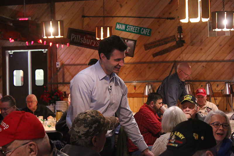 Jason Church greets attendees in Bloomer